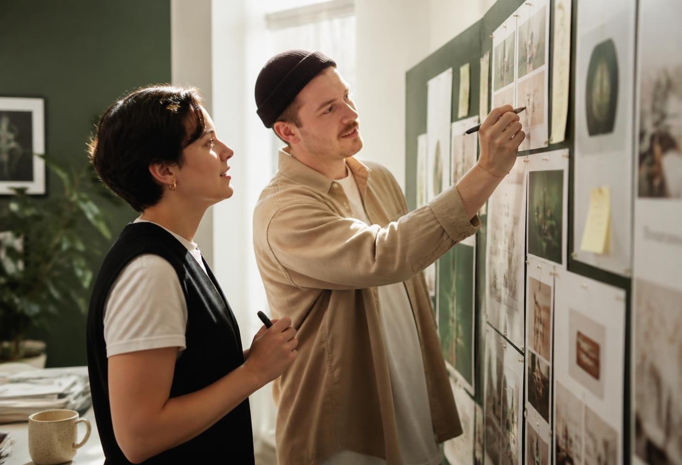 A creative professional reviewing design feedback on screen
